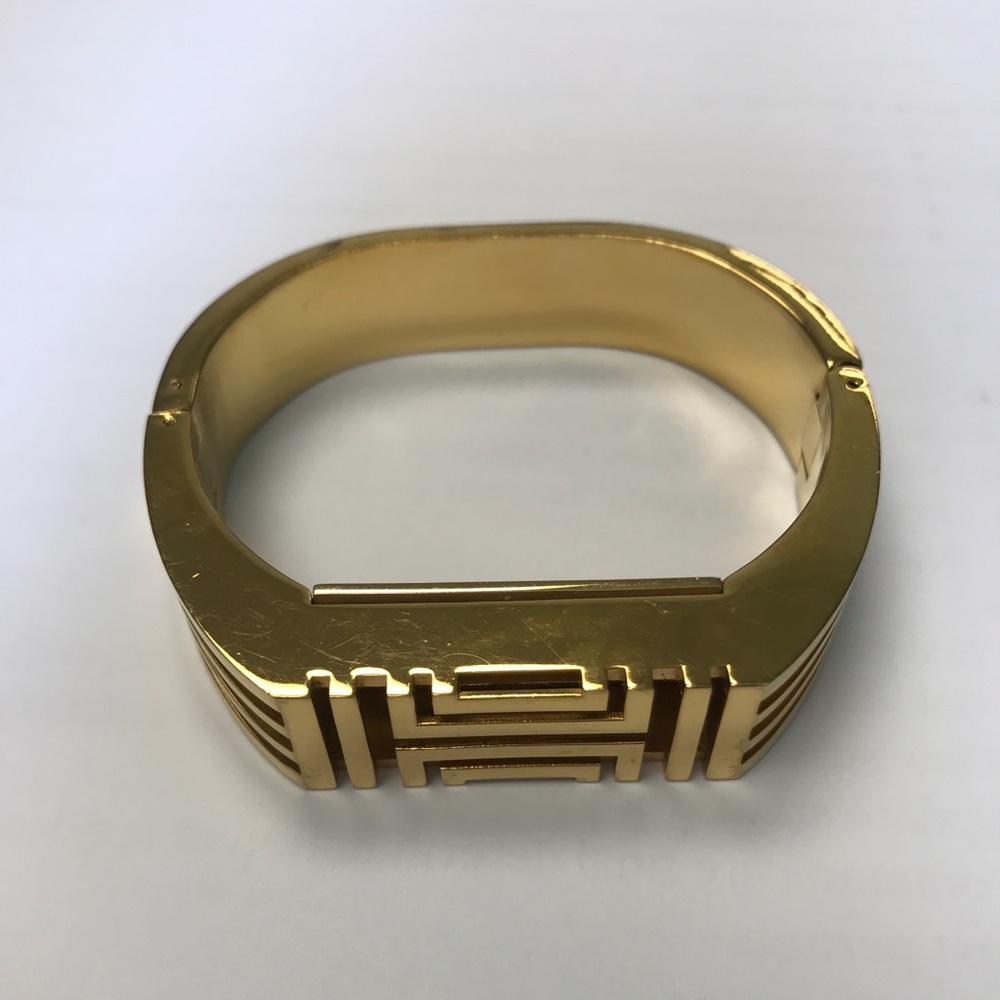 Tory Burch For Fitbit 16k gold Hinged Bracelet.
